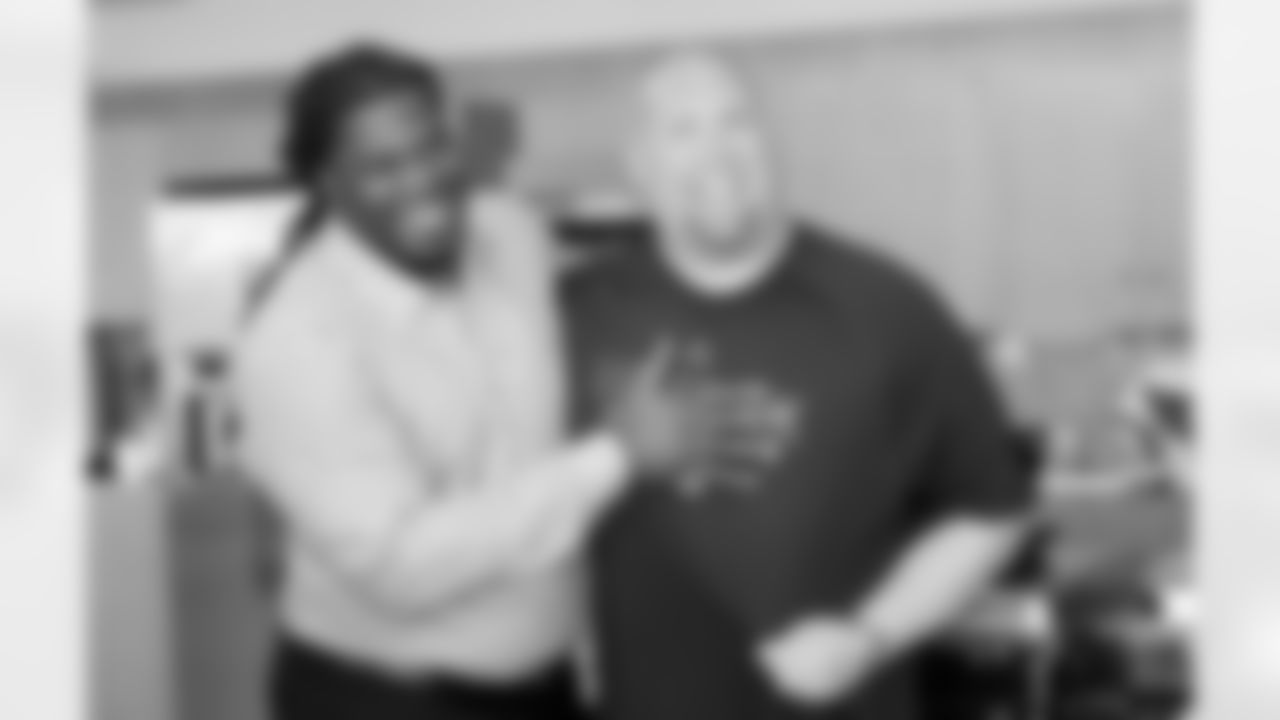 GM Steve Keim jabs UNC's Cooper with NC State shirt