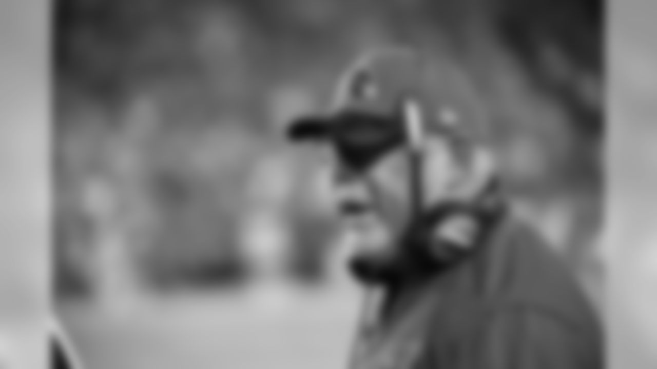 Head coach Bruce Arians speaks with the refs