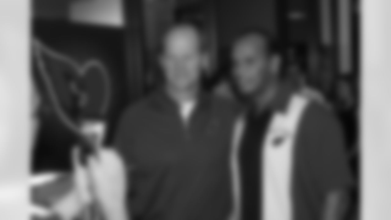 Coach Ken Whisenhunt poses for a picture