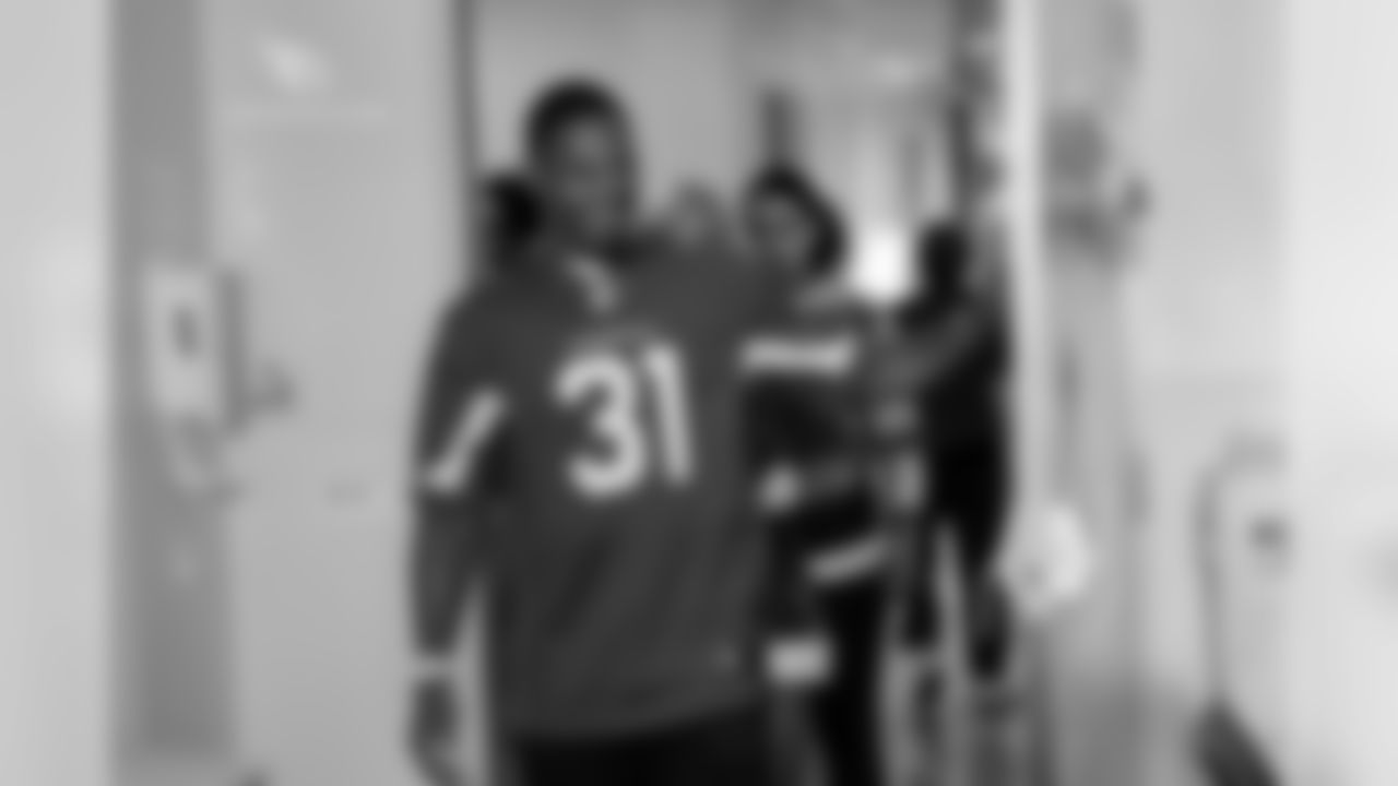 RB David Johnson walks in to a patient's room