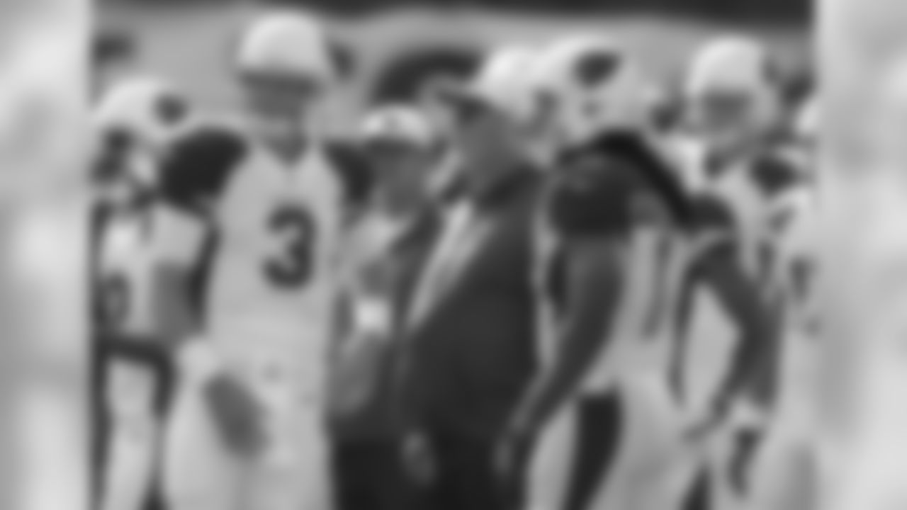 From left: QB Carson Palmer, coach Bruce Arians, WR Larry Fitzgerald