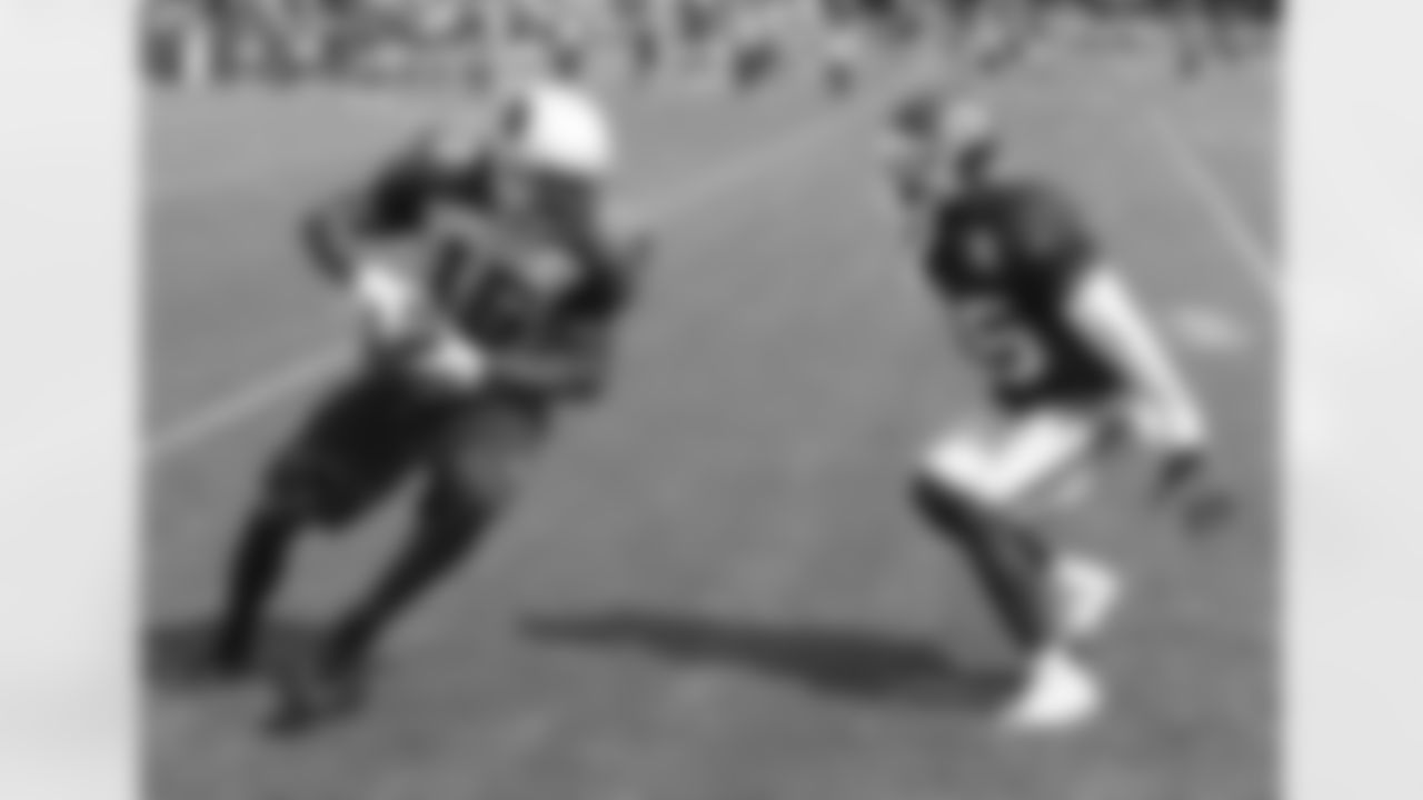 WR Michael Floyd in front of CB Jacques Reeves