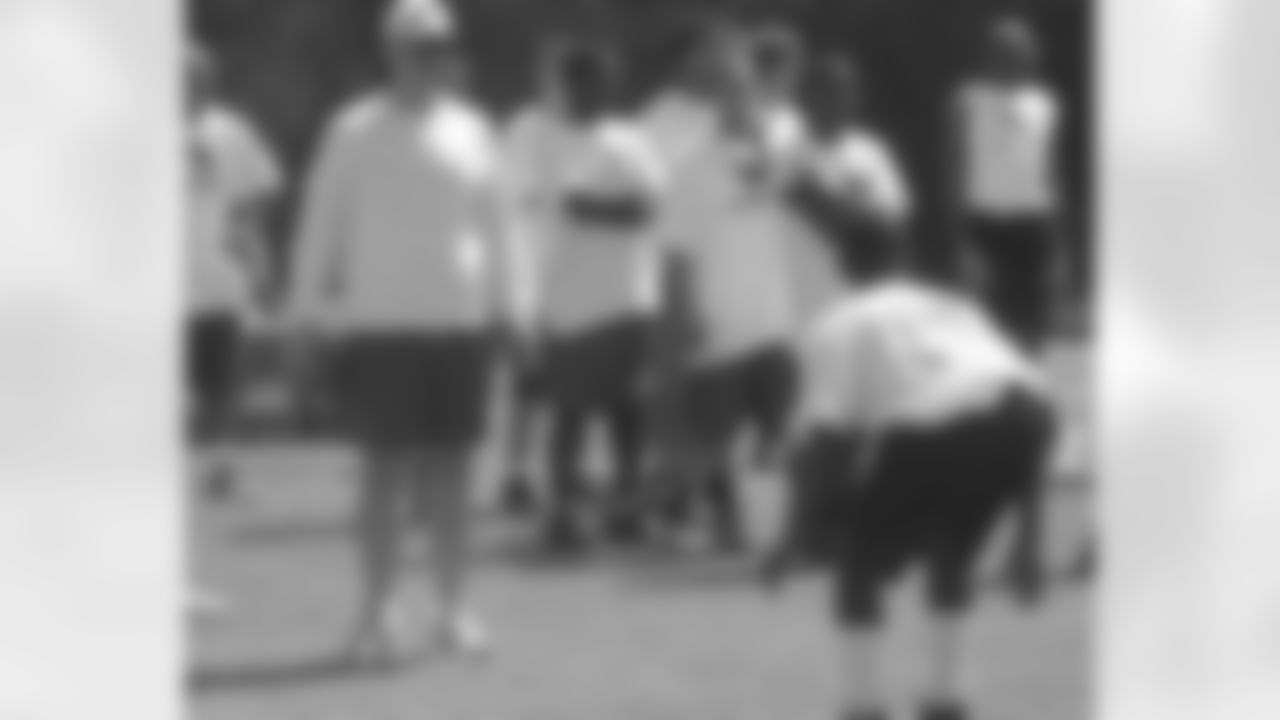 Assistant defensive backs coach Rick Cortright looks on