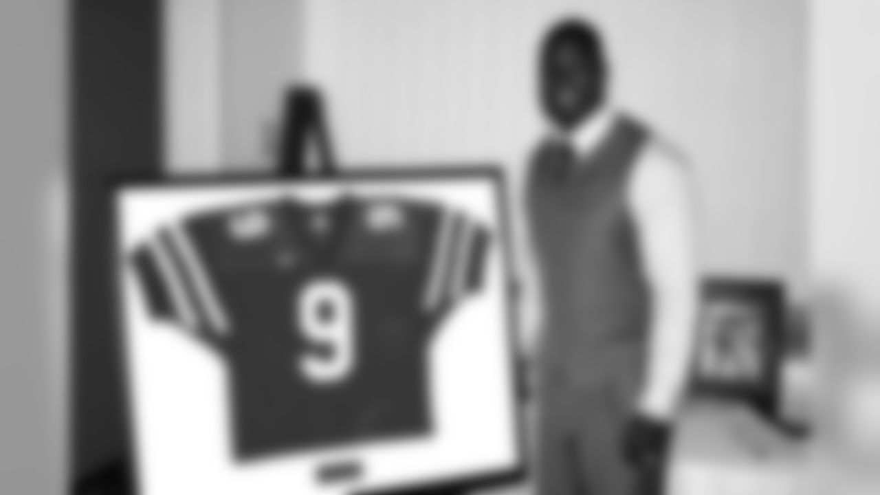 Wilson with his retired jersey.