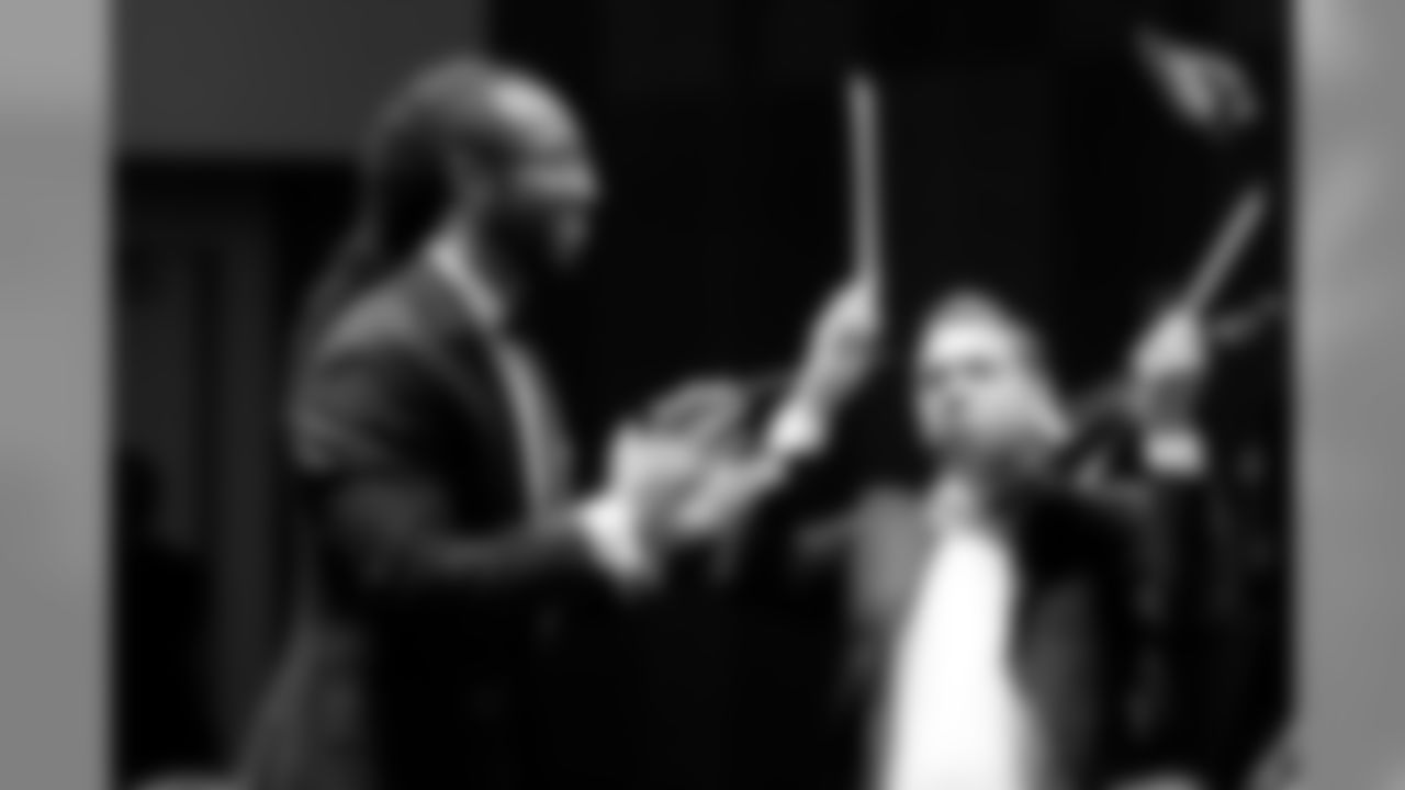 WR Larry Fitzgerald conducts an orchestra.
