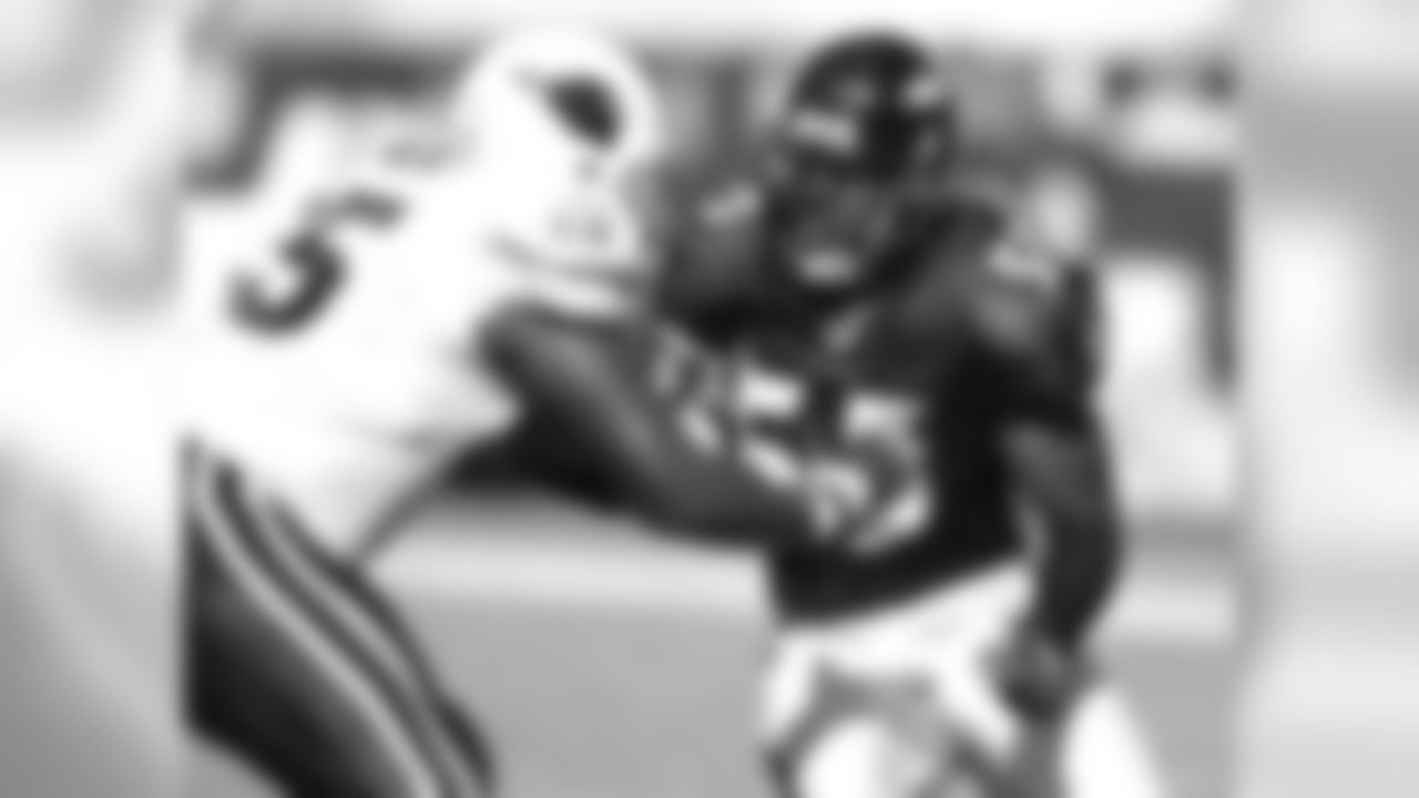 2003: Ravens linebacker Terrell Suggs (55) pass rushes during an NFL game against the Cardinals on October 12, 2003.