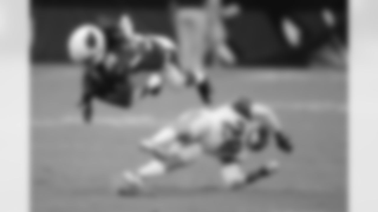 RB Andre Ellington goes airborne in Week 2 against the Lions.
