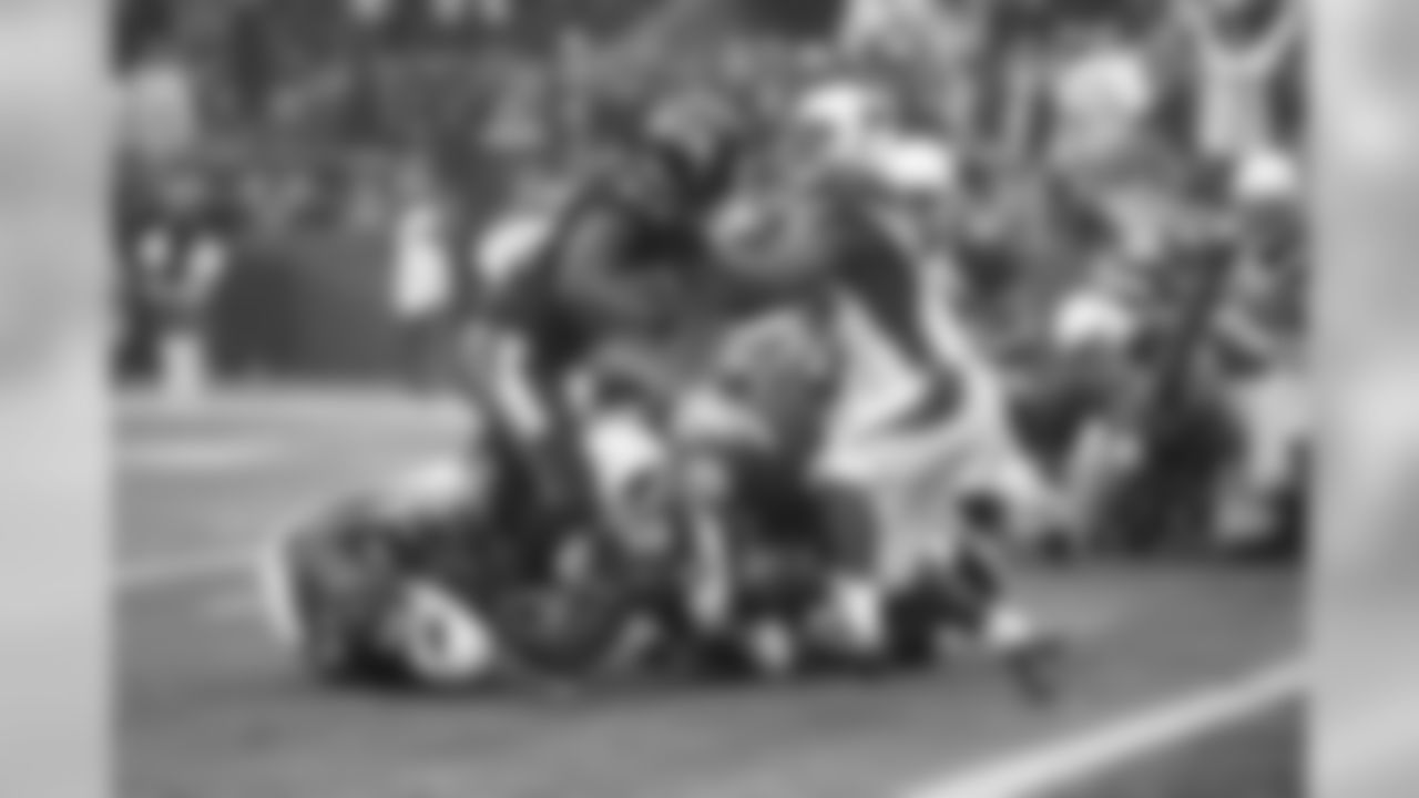 Week 16: LB Daryl Washington stones Seahawks RB Marshawn Lynch in a crucial goal-line stand.