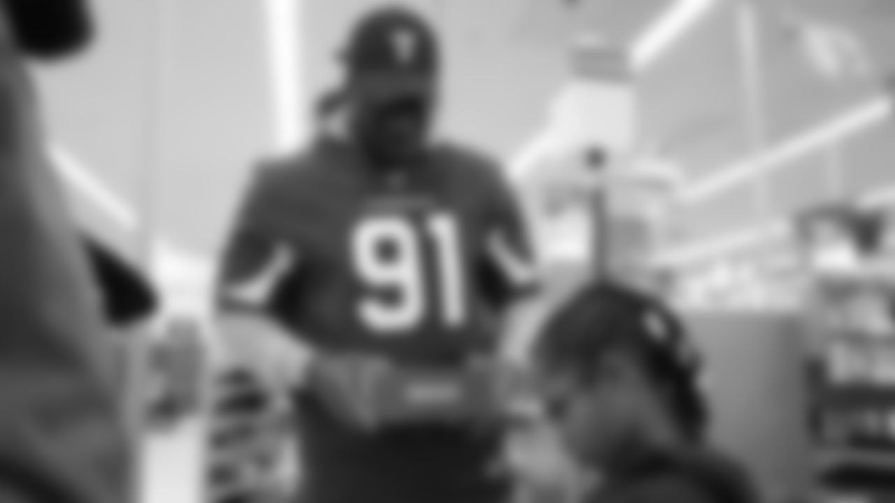 DE Michael Dogbe at a Shop with a Jock shopping spree.