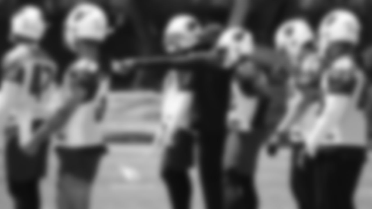 DB coach Marcus Robertson gives some direction