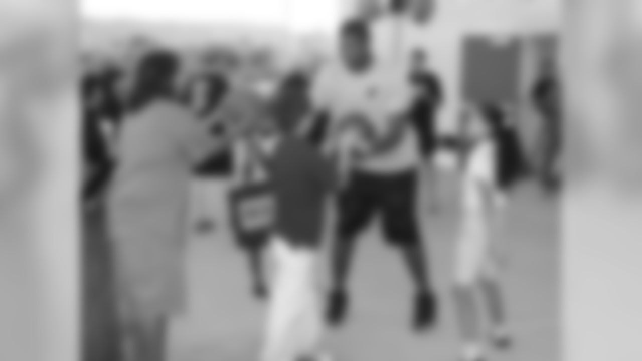 Campbell plays basketball with the students