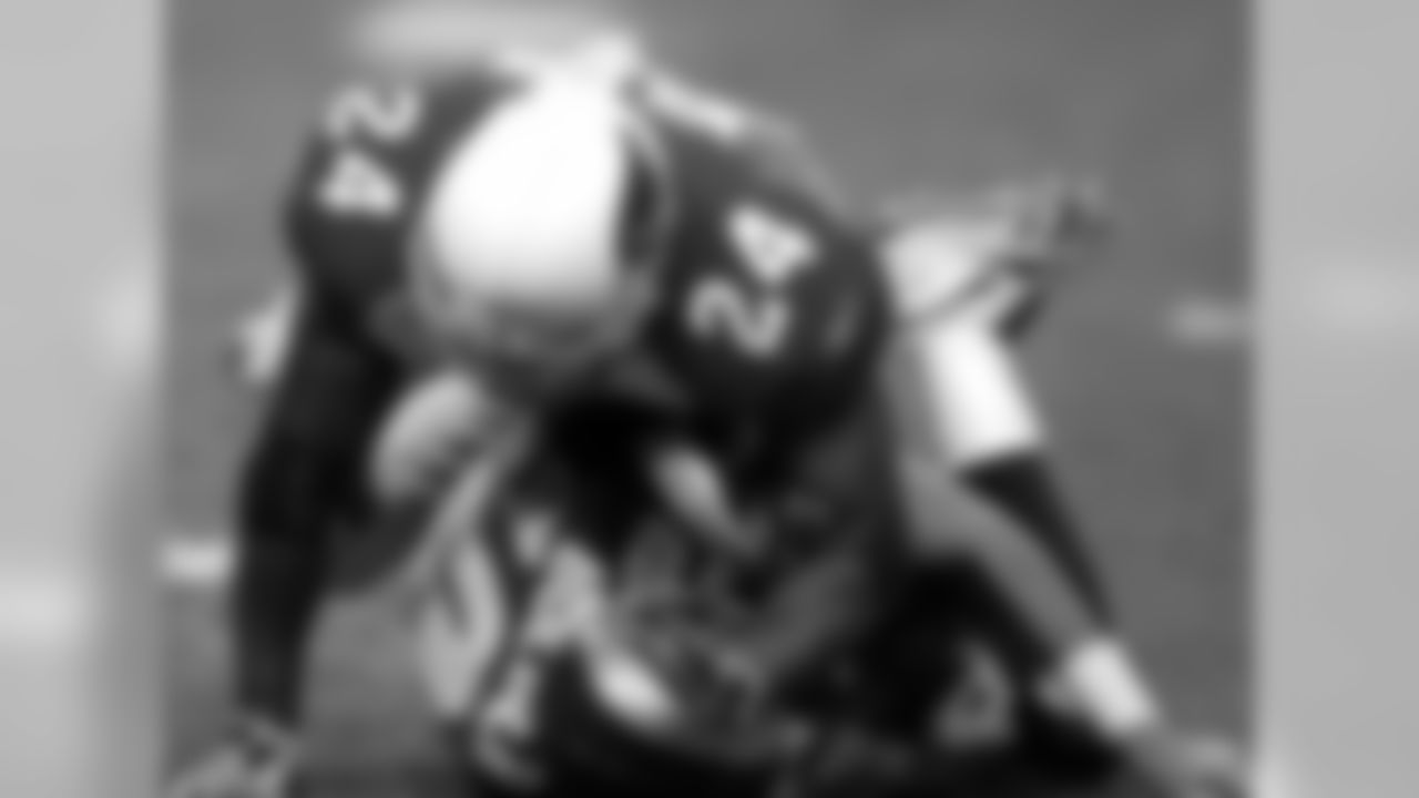 2005: Cardinals S Adrian Wilson tackles Rams QB Marc Bulger