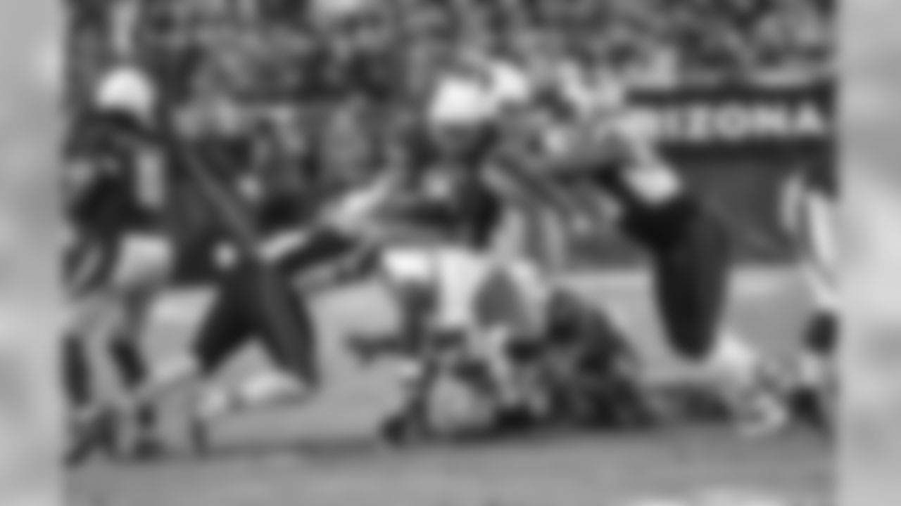 Johnson fights through New England tacklers