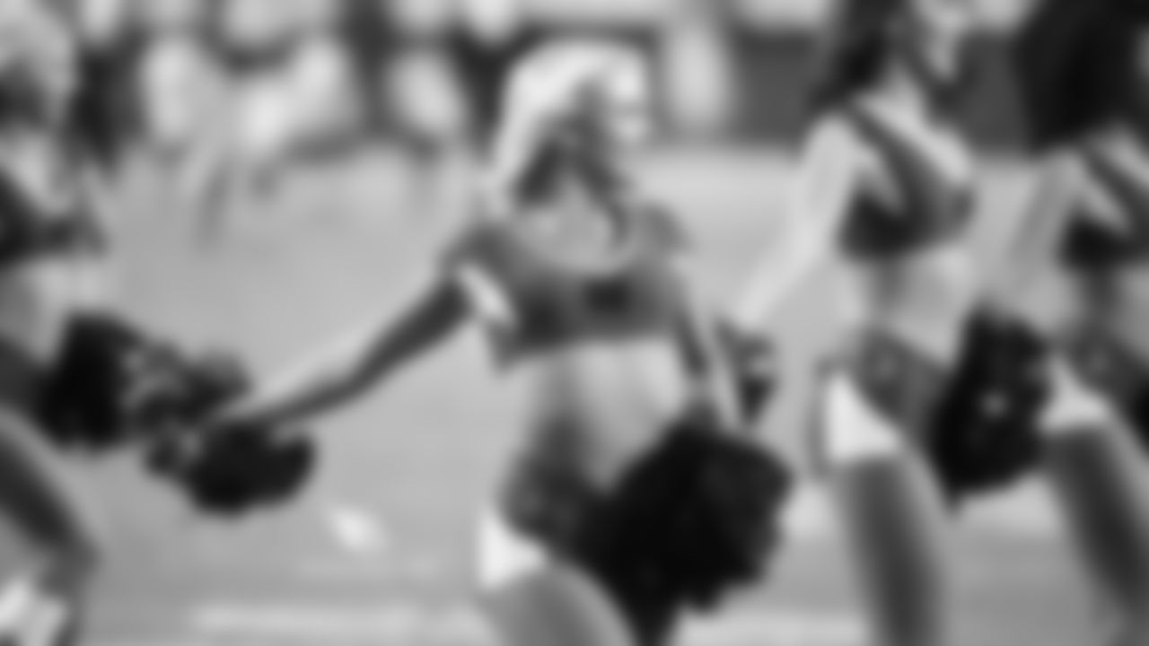 Images of Cardinals cheerleader Davis from the 2018 season
