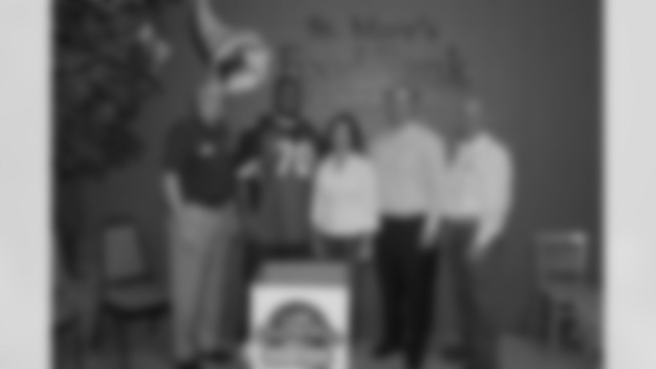 Representatives of Sagicor Life Insurance and St. Mary's Food Bank