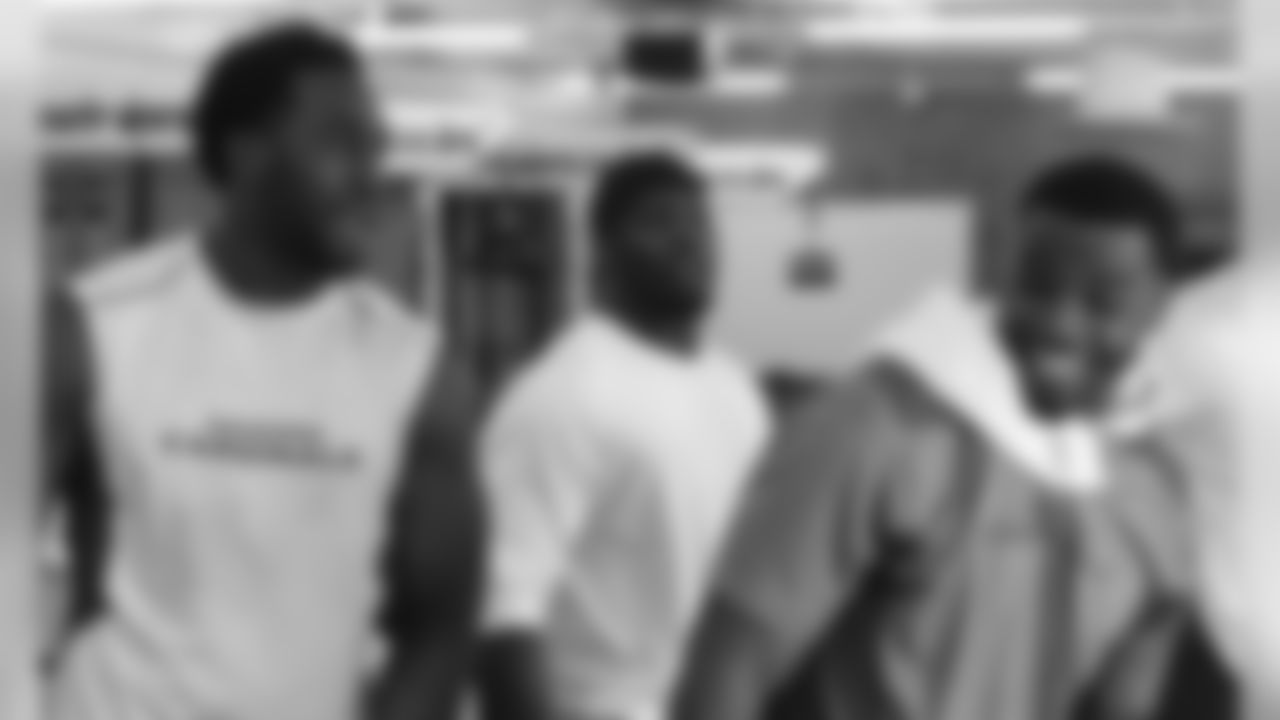 LBs Alex Okafor, Marcus Benard and Daryl Washington share a chuckle