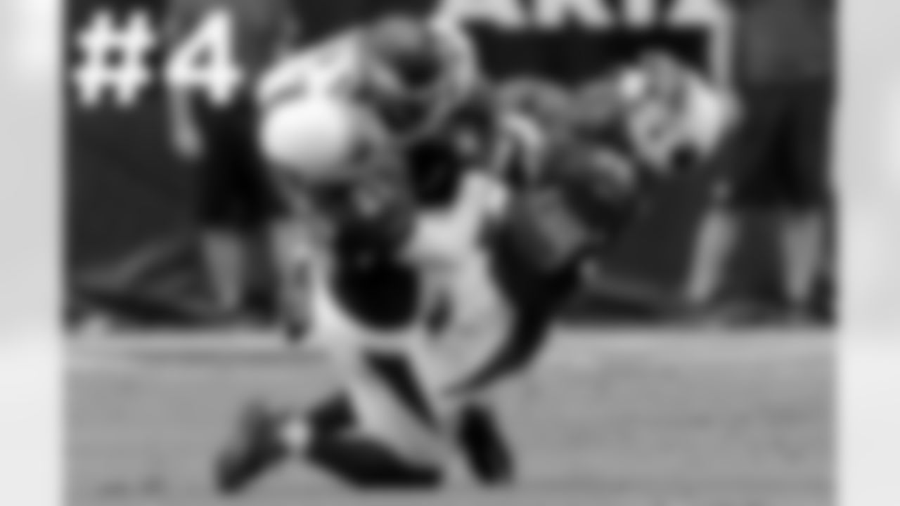 S Deone Bucannon (right) loses his helmet in a big collision with Eagles WR Jeremy Maclin and CB Patrick Peterson