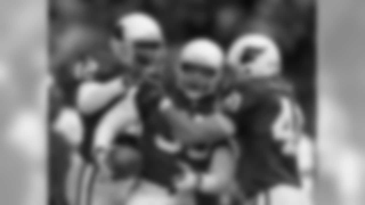 1998 - S Kwamie Lassiter (42), CB Aeneas Williams (35) and S Pat Tillman (40) happy after Williams' playoff INT in Dallas
