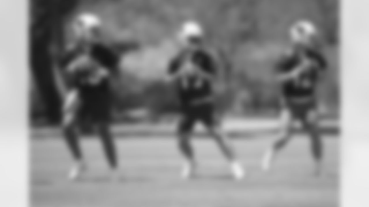 Arizona Cardinals quarterback Jarrett Guarantano (16), Arizona Cardinals quarterback Trace McSorley (19) and Arizona Cardinals quarterback Colt McCoy (12) practice during Week 1 of the OTA offseason program on Monday, May 23, 2022 in Tempe, AZ.