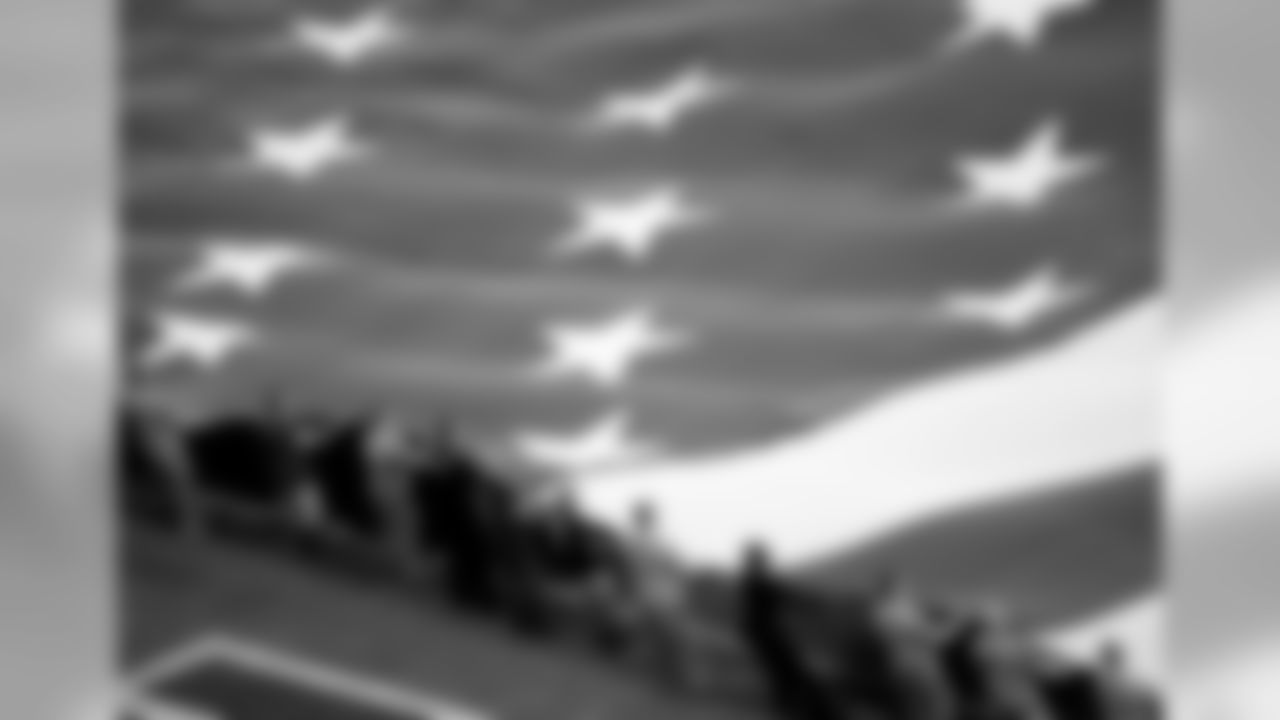The American flag is displayed for the National Anthem