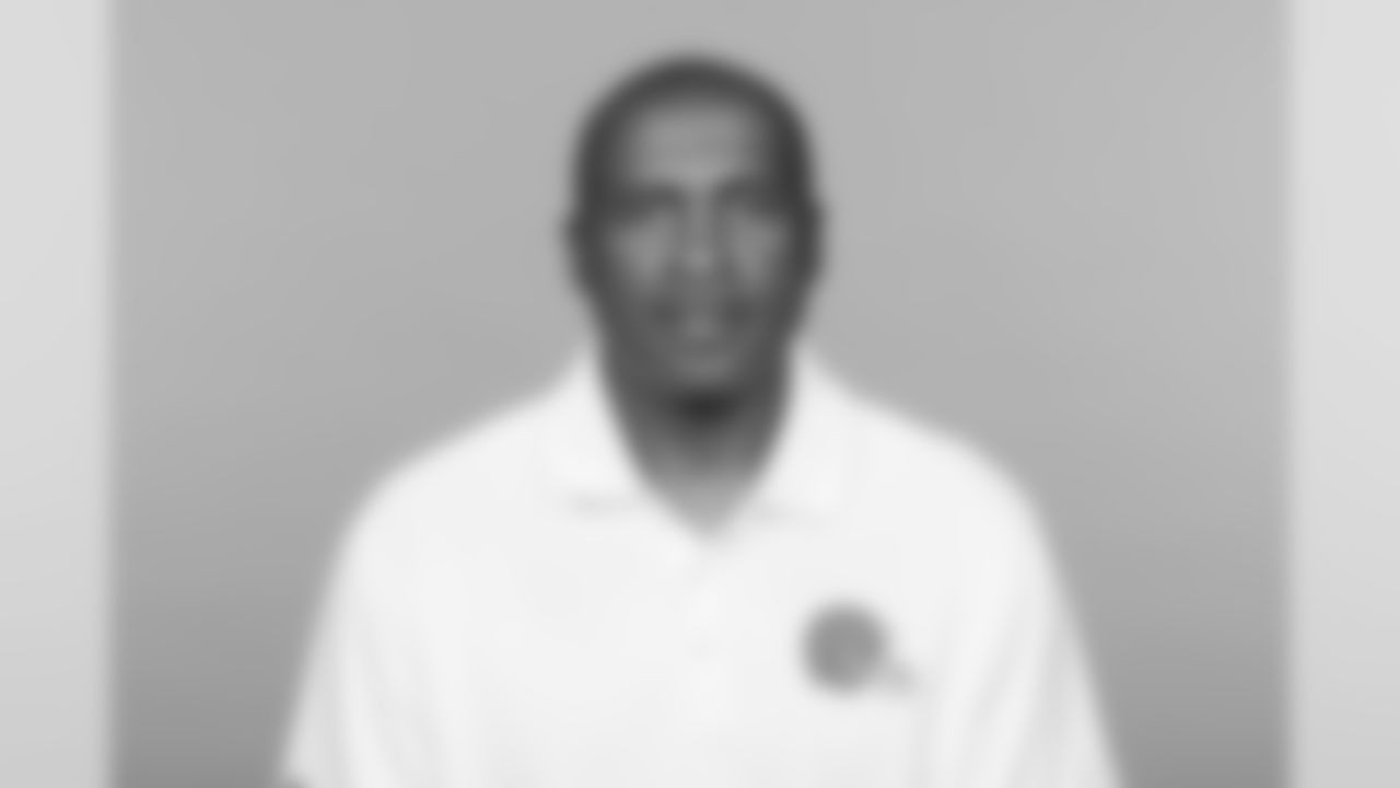 Running backs coach Kirby Wilson