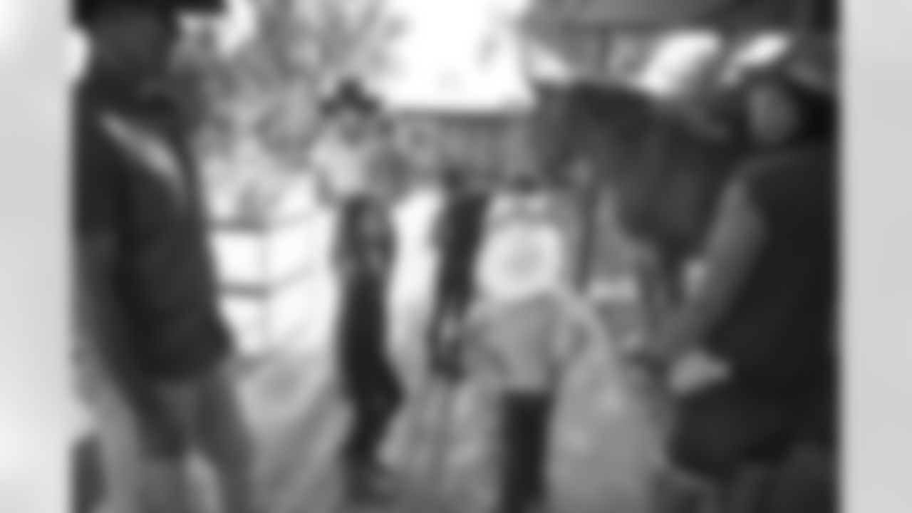 The Arizona Cardinals visit Hunkapi Farms to work with therapy horses and families with ALS on Saturday, May 13, 2023 in Scottsdale, AZ.