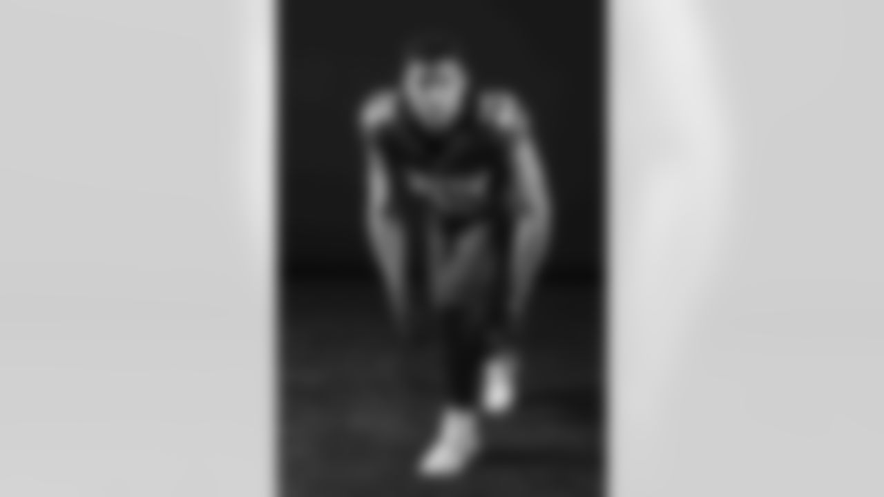 Arizona Cardinals linebacker Zaven Collins (25) poses for a photo during a photoshoot for the 2023 Arizona Cardinals Uniforms on Thursday, April 13, 2023.