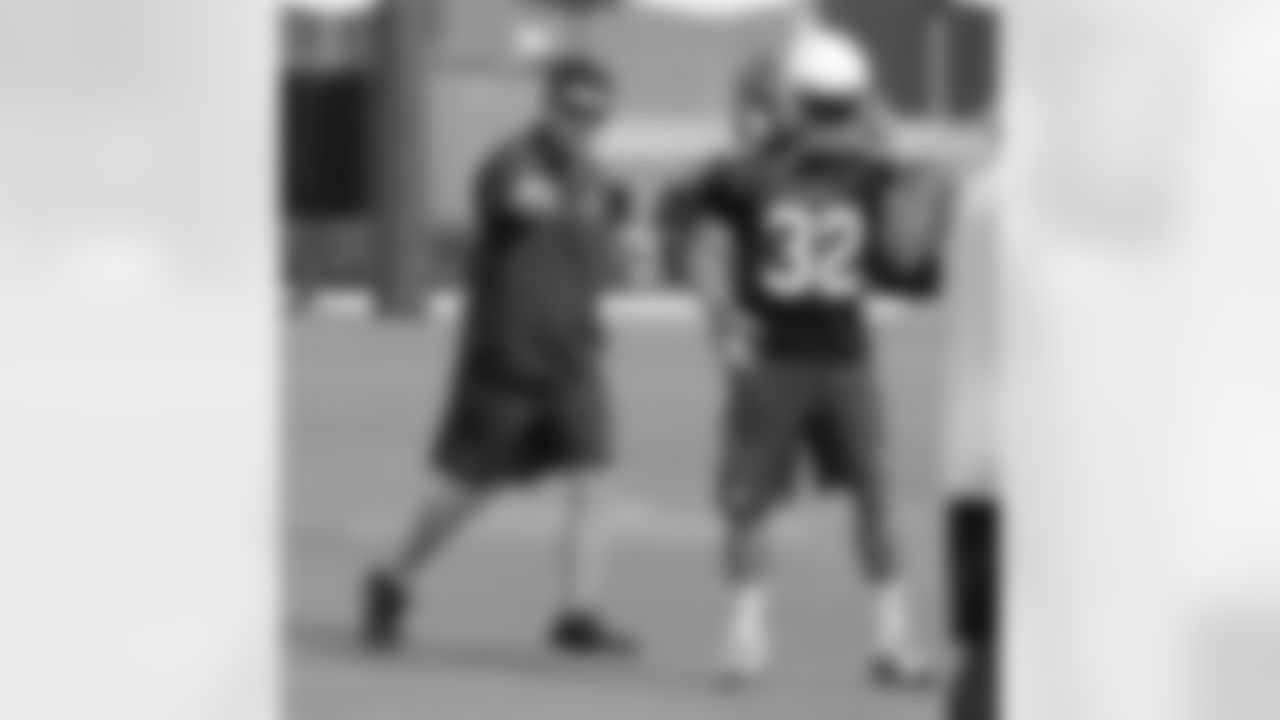 Defensive backs coach Nick Rapone instructing S Tyrann Mathieu