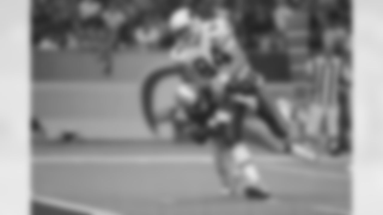 1998: TE Chris Gedney is tackled by Seattle's Fred Thomas