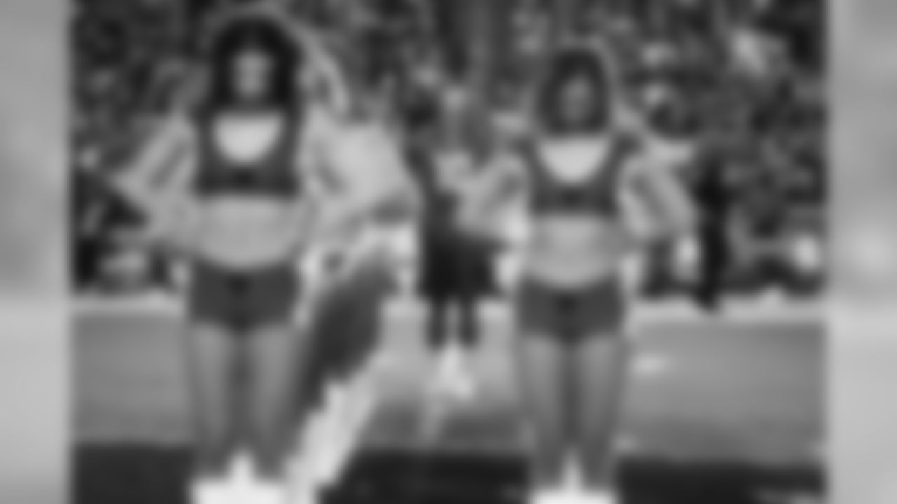 Images of the Cardinals cheerleaders practicing and performing with celebrity fitness motivator Shaun T