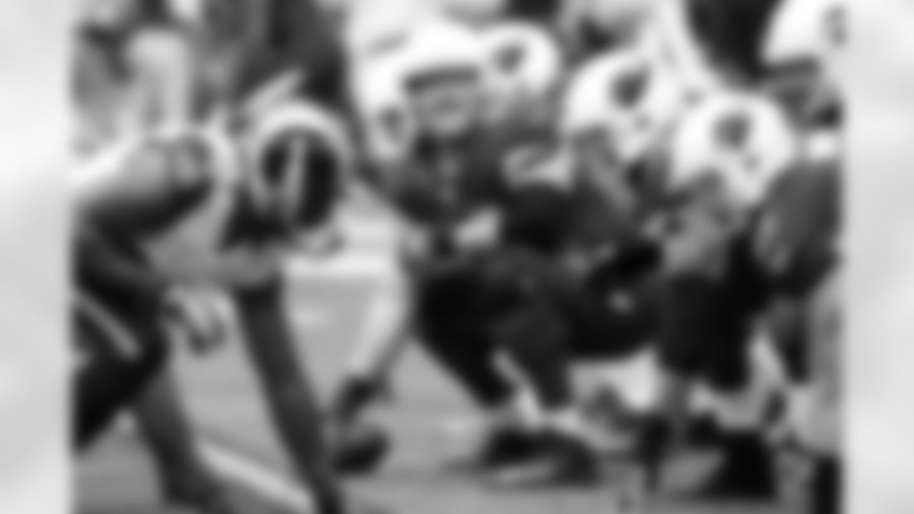 Lyle Sendlein prepares to snap the ball.