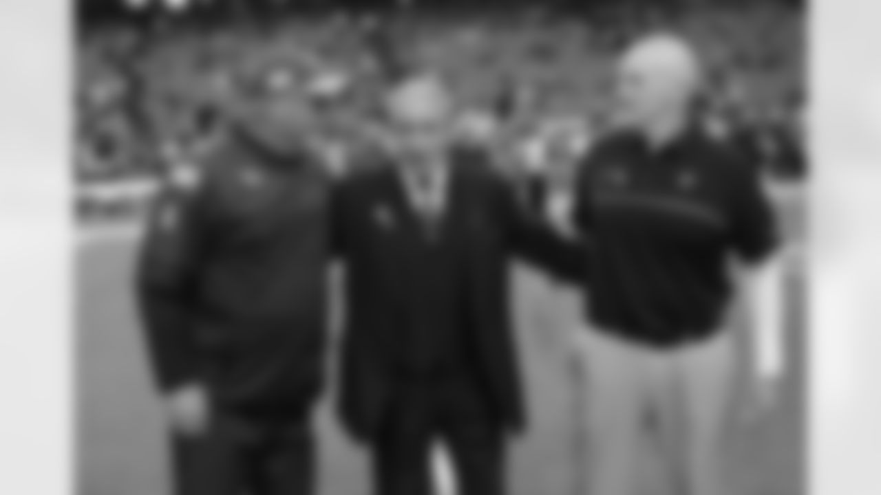Cardinals head coach Bruce Arians (left) with Falcons owner Arthur Blank (center) and head coach Dan Quinn (right)