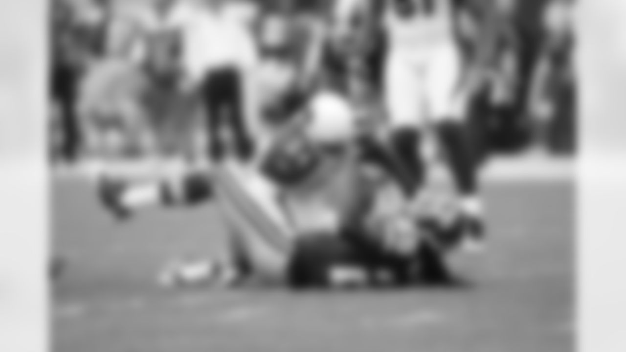 Wilson tackles his old teammate