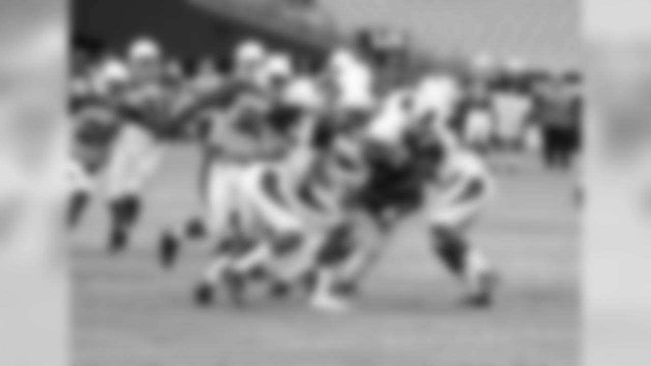 RB Paul Lasike is gang-tackled