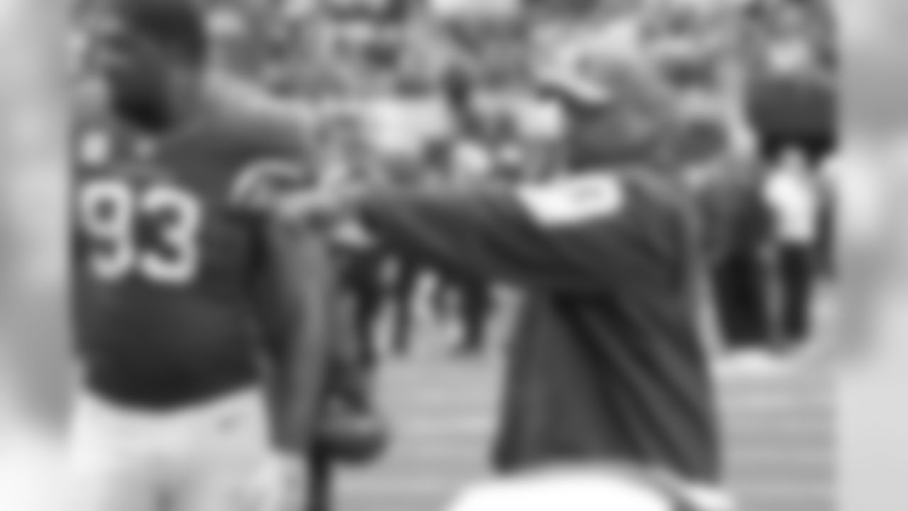 OC Harold Goodwin coaches players before the Dallas game