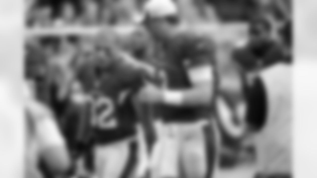 Carson Palmer doles out some advice to Tyrann Mathieu