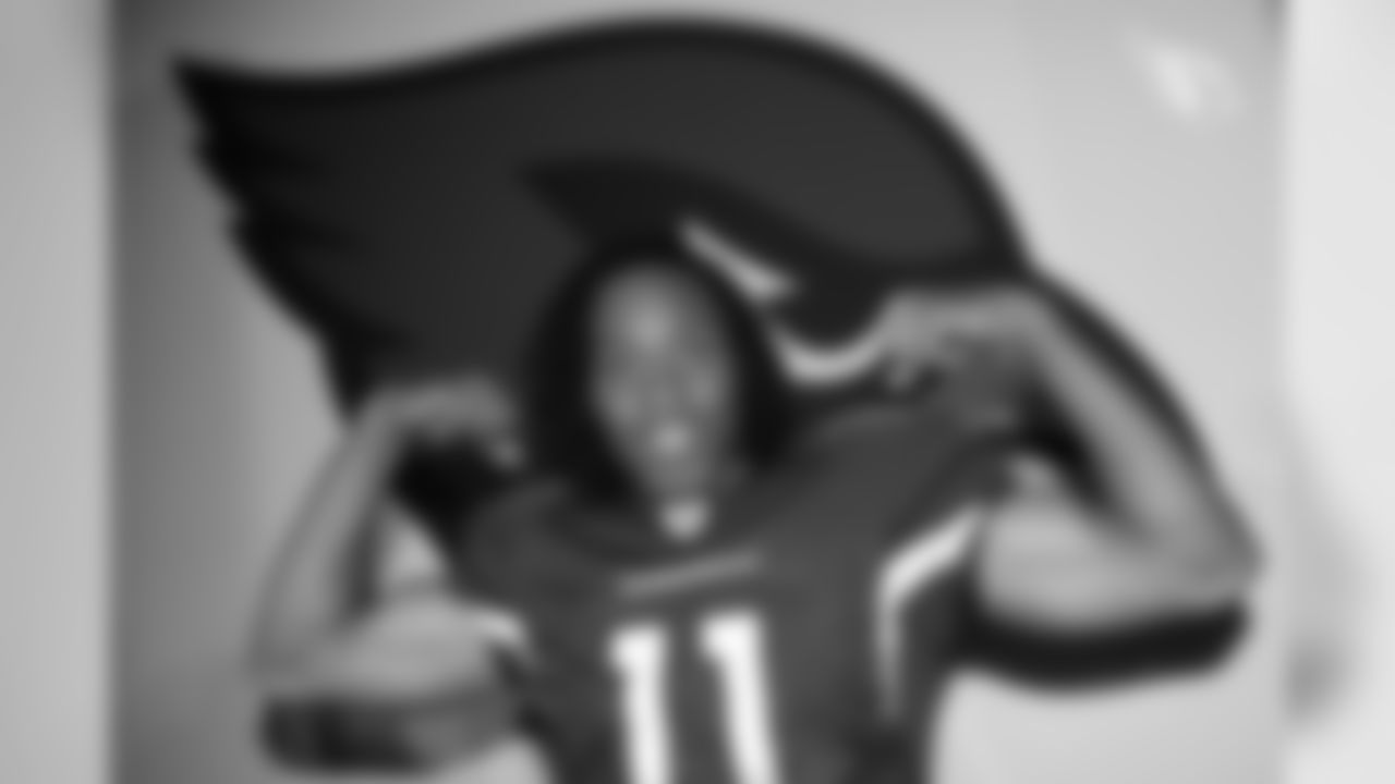 WR Larry Fitzgerald unveiling the Cardinals' new uniforms in 2005.