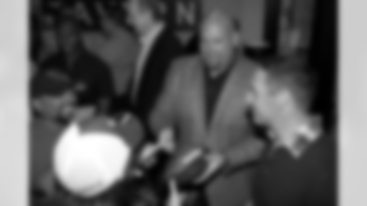 Steve Keim signs an autograph