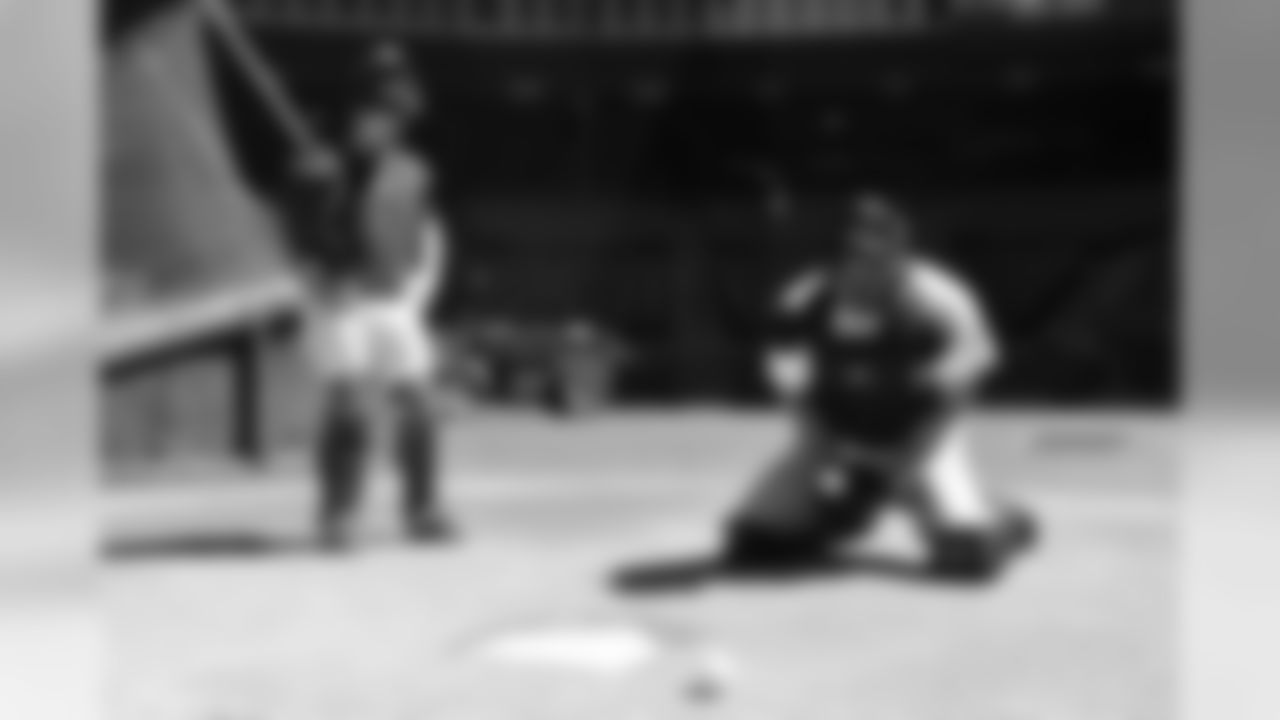 T Jared Veldheer is taught how to block a pitch in the dirt