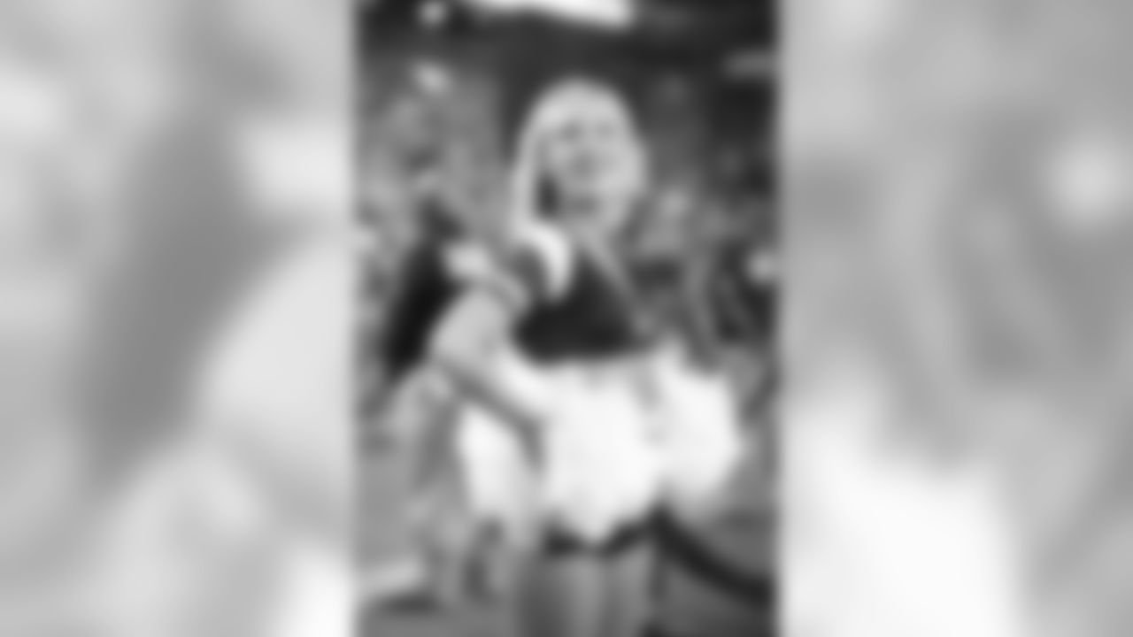 Images of Cardinals cheerleader Davis from the 2018 season
