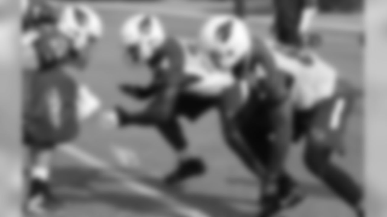 T D.J. Humphries (left) and TE Jermaine Gresham