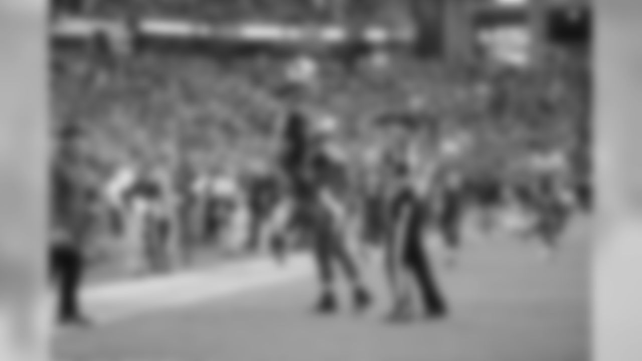 WR Larry Fitzgerald celebrates his touchdown against the Colts.