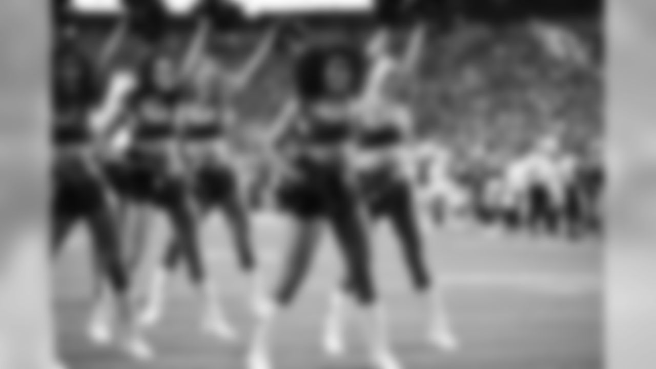 Images of Cardinals cheerleader Tequasia during the 2019 season