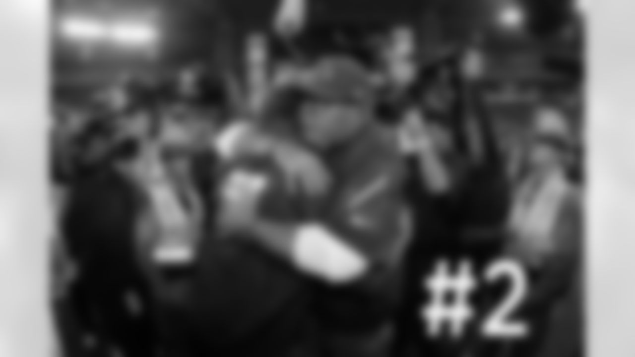 Bruce Arians and Chuck Pagano embrace after the game.