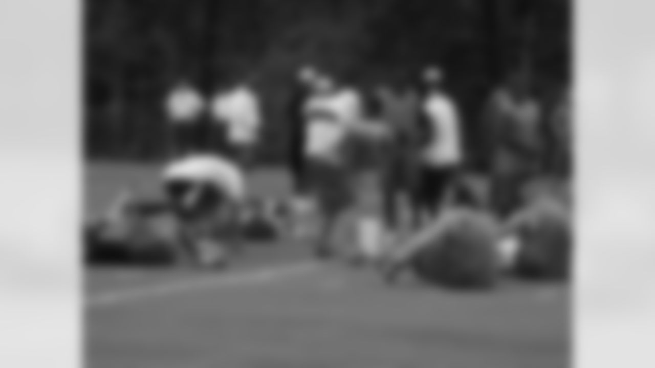 Players stretch prior to the conditioning test