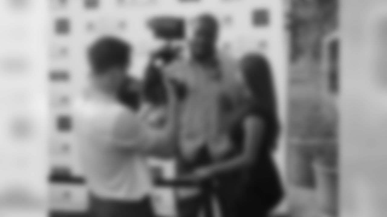DE Cory Redding getting interviewed