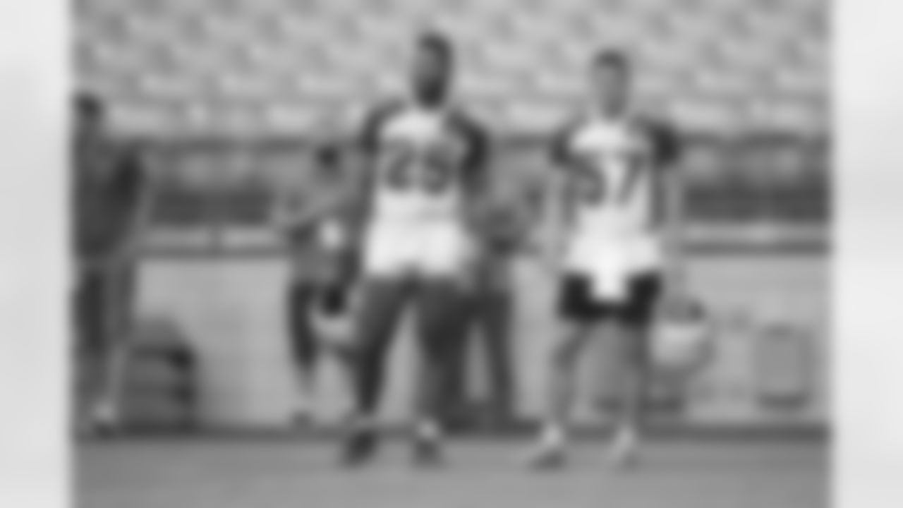 Arizona Cardinals linebacker Zaven Collins (25) and Arizona Cardinals linebacker Nick Vigil (57) during the 2022 Arizona Cardinals Training Camp at State Farm Stadium on Wednesday, July 27, 2022 in Glendale, AZ.