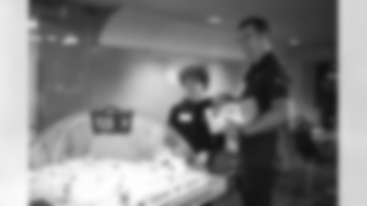 Arizona Cardinals punter Nolan Cooney (16) visits Phoenix Children's Hospital on Tuesday, May 23, 2023 in Phoenix, AZ.