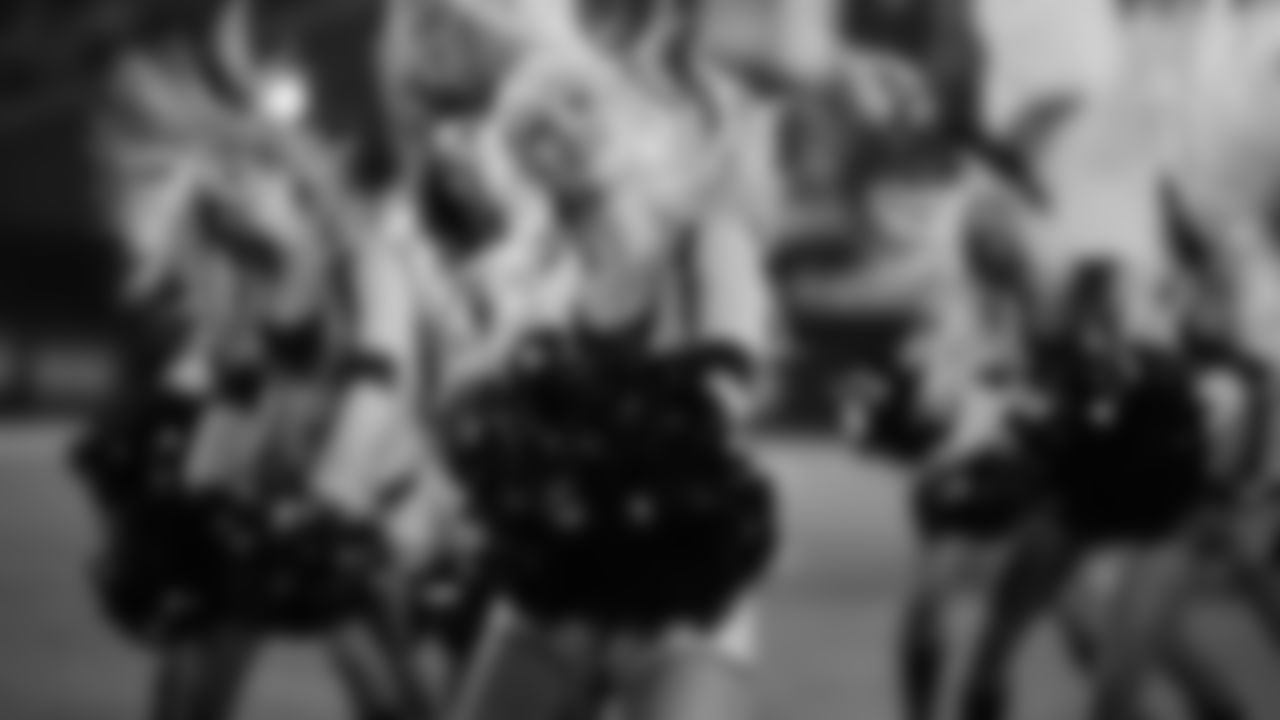 Images of Cardinals cheerleader Davis during the 2019 season