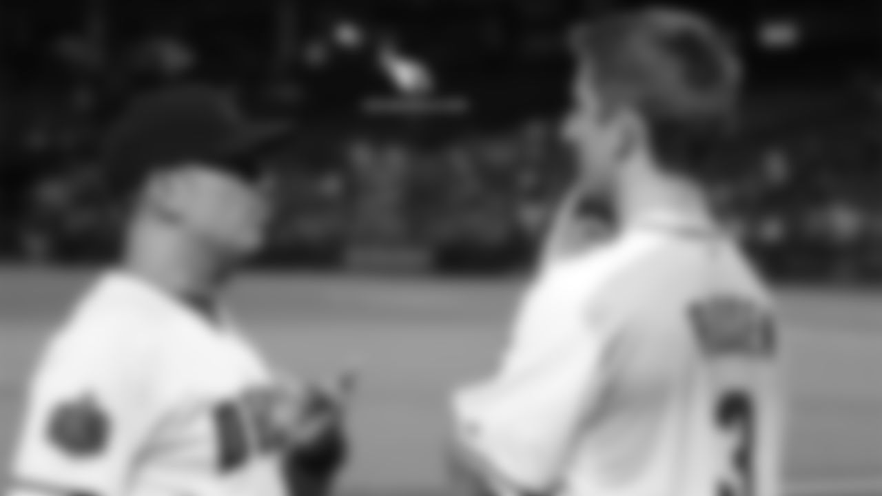 Diamondbacks manager Torey Lovullo (left) and Cardinals QB Josh Rosen